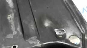 The right rear bumper guard for a Honda Clarity 18-21 USA is dented.
