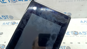 The monitor, display, and navigation system for a Honda Clarity 18-21 USA is worn and scratched.