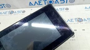 The monitor, display, and navigation system for a Honda Clarity 18-21 USA is worn and scratched.