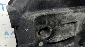 The left underbody protection of the Lexus NX300h 15-21 is scuffed and dented.