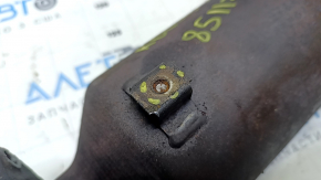 The Nissan Rogue Sport 20's exhaust pipe and catalytic converter are rusty and the bolts are broken.