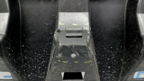 The front bumper guard of the Audi Q8 19-23 is dented