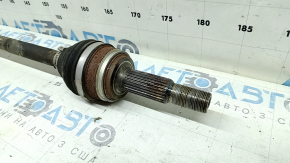 The rear left half shaft of a Lexus NX300h 15-21 AWD is rusty.