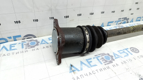 The rear left half shaft of a Lexus NX300h 15-21 AWD is rusty.