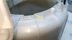 The bare heater housing of a Nissan Rogue Sport 19-22 dual zone for heated seats has cracks and a broken latch.