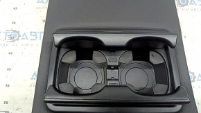 The back of the rear row of seats, center, BMW 3 G20 19-22, black leather, whitened leather, scratches on the plastic, scuffs