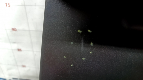 The back of the rear row of seats, center, BMW 3 G20 19-22, black leather, whitened leather, scratches on the plastic, scuffs