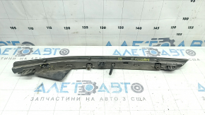The right rear bumper molding for a Lexus NX300h 15-21 has a broken mount.
