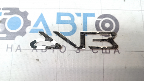 The EV6 emblem on the Kia EV6 22-24 trunk door