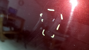 Bare hood of a 1996 Honda Accord hybrid, restyling, aluminum, red R-543P, scratches, nicks