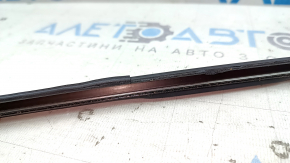 The right roof lining on a 2013-2017 Honda Accord has a cracked seal.