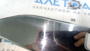 Trunk lid molding for a 1996 Honda Accord hybrid, restyling, chrome, scratches, and chrome defects.