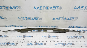 Trunk lid molding for a 1996 Honda Accord hybrid, restyling, chrome, scratches, and chrome defects.