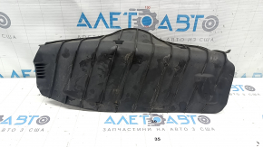 The lower control arm lining under the rear left spring of the Audi Q8 19-25 is worn out.