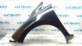 The front left fender of a Nissan Leaf 13-17 has a dented arch.