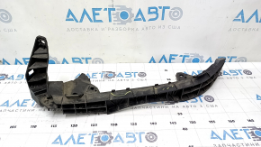 The front bumper mount under the left headlight of a Honda Accord 13-17 is broken.