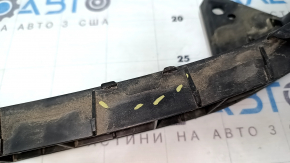 The front bumper mount under the left headlight of a Honda Accord 13-17 is broken.