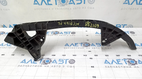 The front bumper mount under the left headlight of a Honda Accord 13-17 is broken.