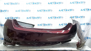 Bare rear bumper for a 1996 Honda Accord with single exhaust and no parking sensors, cracked.