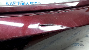 Bare rear bumper for a 1996 Honda Accord with single exhaust and no parking sensors, cracked.