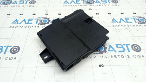 The Audi Q8 19-25 battery distribution plate in the passenger's footwell