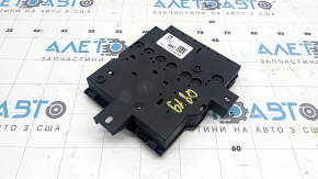 The Audi Q8 19-25 battery distribution plate in the passenger's footwell