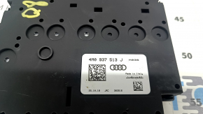 The Audi Q8 19-25 battery distribution plate in the passenger's footwell