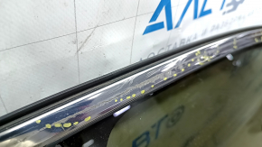The front right door of a Toyota Venza 21-24 black model 202 is bare and dented.