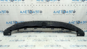 The lower front bumper absorber of a Toyota Venza 21-24 is pressed and worn.