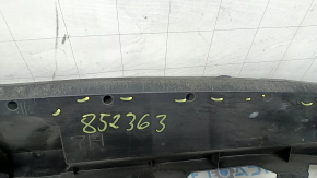 The lower front bumper absorber of a Toyota Venza 21-24 is pressed and worn.