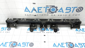 The rear bumper center mount on a Ford Mustang mk6 15-23 is broken.