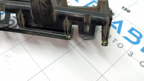 The rear bumper center mount on a Ford Mustang mk6 15-23 is broken.