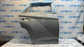 The bare rear right door of a Hyundai Tucson 22-24