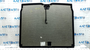 The trunk floor of a Mercedes GLC 20-22 is black, with scratches on the handle.
