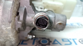 The brake master cylinder with vacuum booster assembly for a Nissan Leaf 13-14 has a broken reservoir mount.