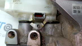 The brake master cylinder with vacuum booster assembly for a Nissan Leaf 13-14 has a broken reservoir mount.