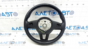 The steering wheel of a Mercedes GLC 20-22 is bare, black leather, heated, with scratches, tears, and dents.