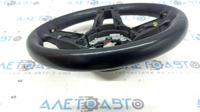 The steering wheel of a Mercedes GLC 20-22 is bare, black leather, heated, with scratches, tears, and dents.