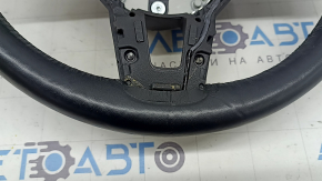 The steering wheel of a Mercedes GLC 20-22 is bare, black leather, heated, with scratches, tears, and dents.