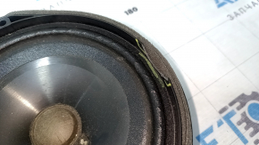 The left speaker on the rear shelf of a Honda Accord 13-17 has a broken edge.