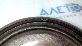 The left speaker on the rear shelf of a Honda Accord 13-17 has a broken edge.