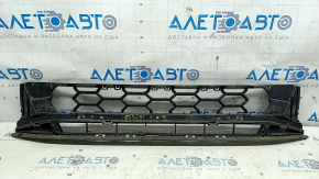 The lower grille of the front bumper of the Audi A4 B9 20-25 S-line is cracked.