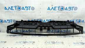 The upper grille of the front bumper of the Audi A4 B9 20-25 is worn.