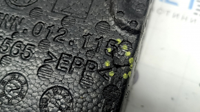 The tool tray for the VW Tiguan 18-22 is torn and dented.