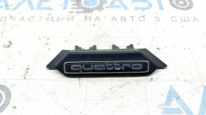 The "quattro" emblem on the radiator grille of the Audi A4 B9 20-25