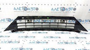 The lower grille of the front bumper, central, VW Tiguan 18-21, under parking sensors, R-Line, is cracked, sand