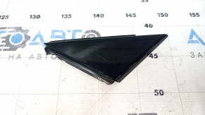 Triangle plug for the front left door of an Audi A4 B9 17-20, glossy black, scratches