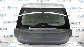 The trunk door is bare with glass, Volvo XC90 16-22 tinted, graphite 714, the glass is scuffed.