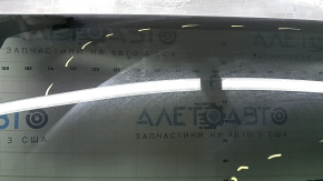 The trunk door is bare with glass, Volvo XC90 16-22 tinted, graphite 714, the glass is scuffed.