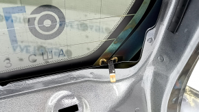 The trunk door is bare with glass, Volvo XC90 16-22 tinted, graphite 714, the glass is scuffed.